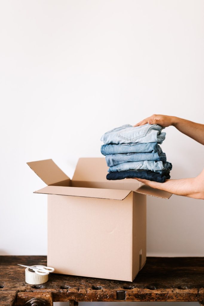 jeans going into a box