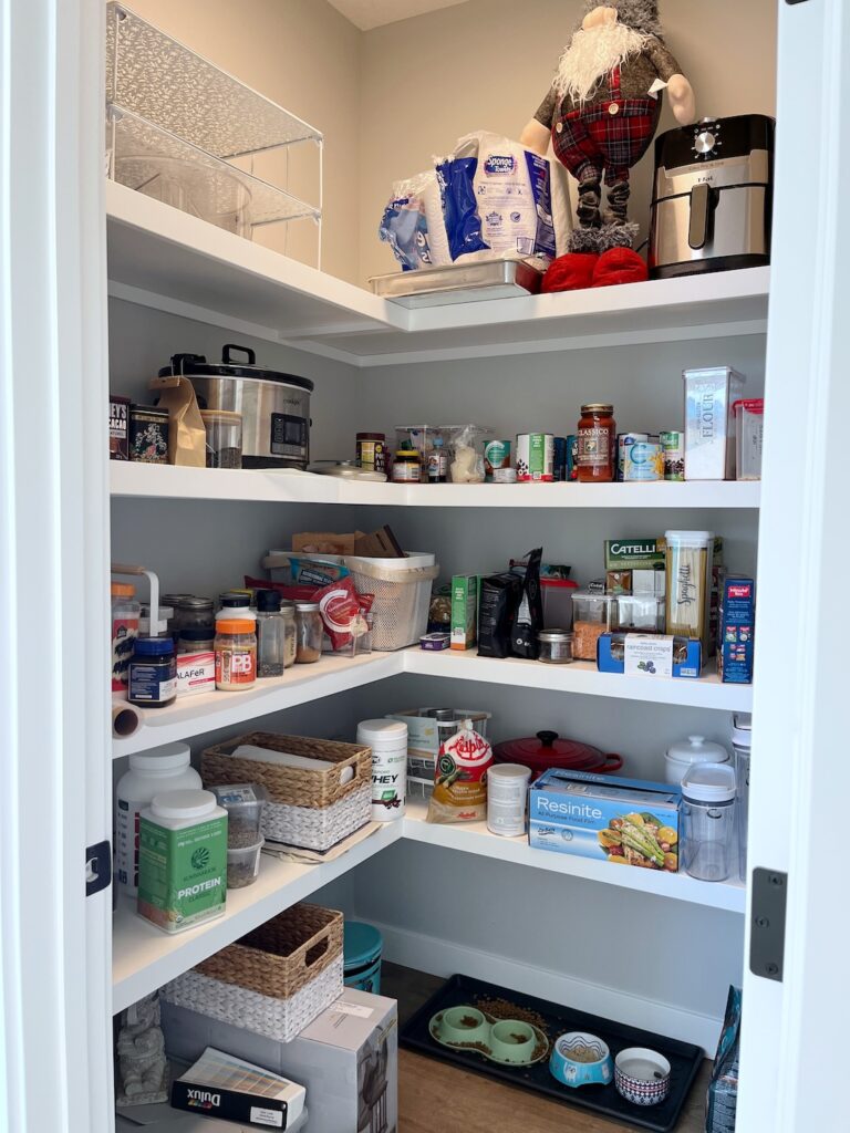 Disorganized pantry with everything scattered and hard to find. 