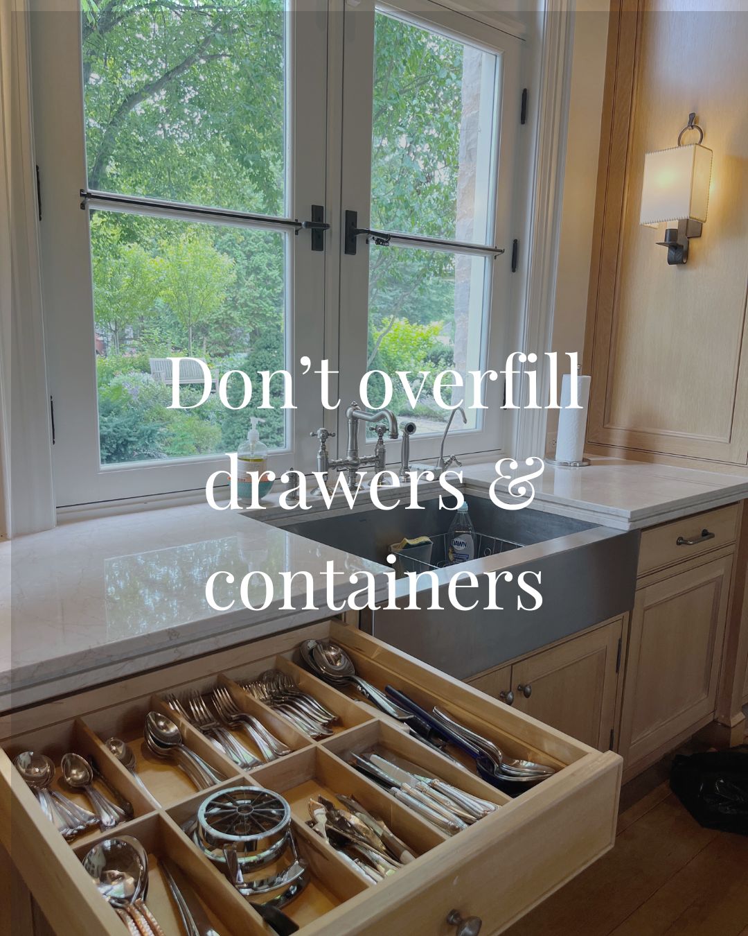 Organized kitchen drawer in Discovery, Calgary with custom drawer dividers that fit perfectly.