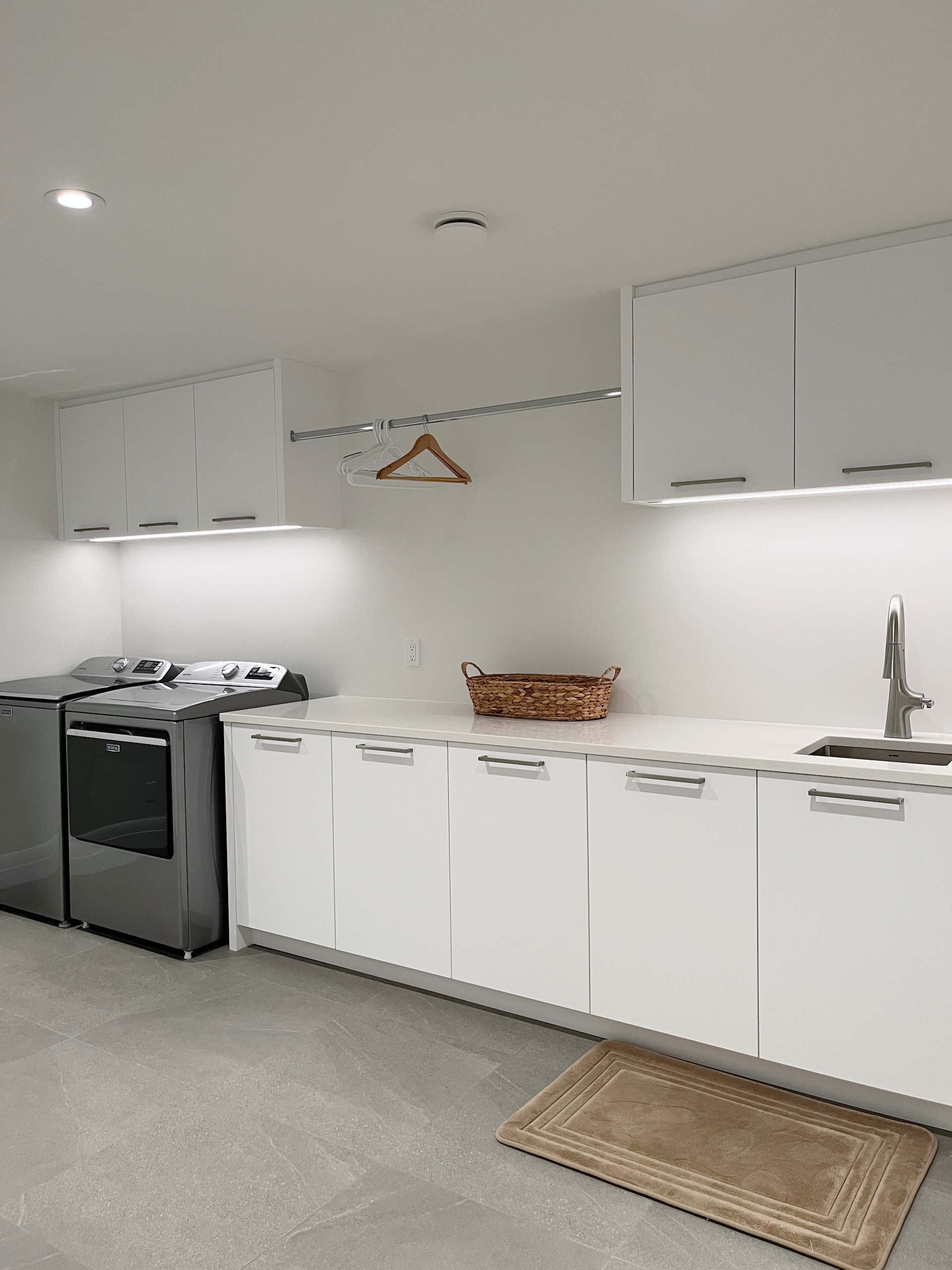 Intuitive laundry systems in Mount Royal, designed for effortless maintenance and a permanent home reset by Well Arranged Home.