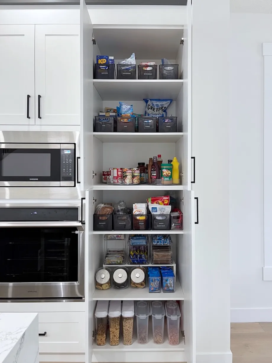 Deep pantry shelf systems in a Mount Royal home, designed by Well Arranged Home to ensure every item is visible and easy to reach.
