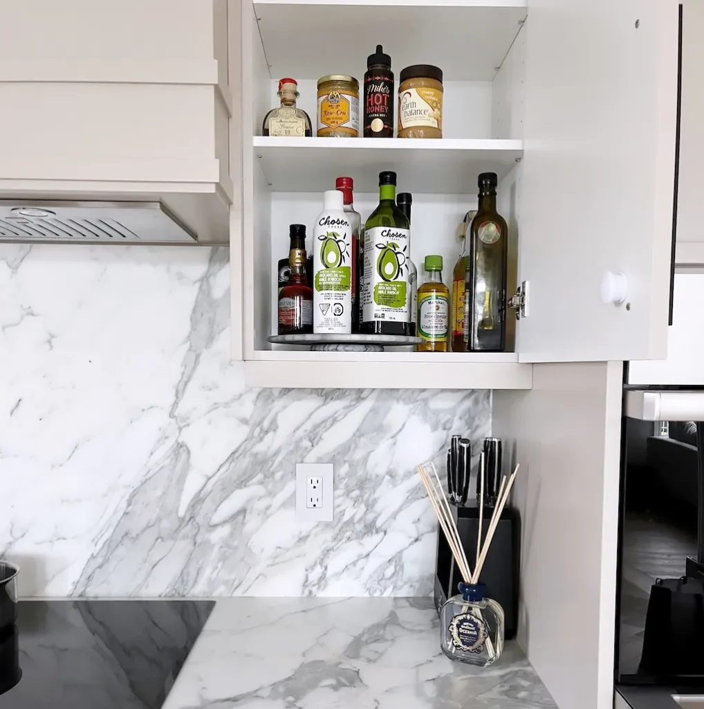 Kitchen storage in Upper Mount Royal, where every shelf has a harmonious flow, making daily meal prep feel effortless and light.