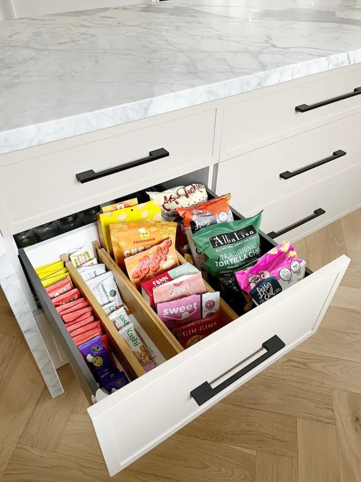 Snack station organization in West Springs, designed to foster independence for children and provide a seamless, stress-free routine for parents.