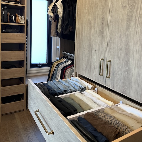 Organized walk in closet in Oakridge, Calgary